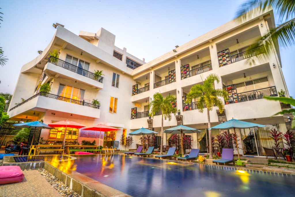 Lounge by the pool at Mad Monkey Hostel Siem Reap - How to Spend 48 Hours in Siem Reap, Cambodia