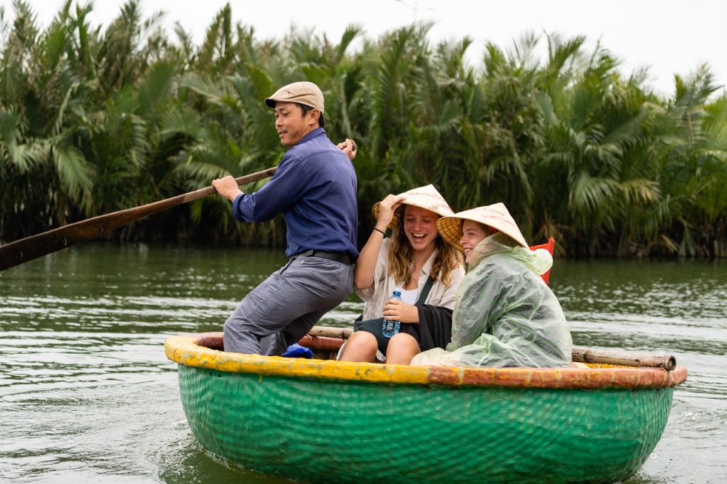 Mad Monkey guests enjoying a ride in the famous bamboo basket boats of Hoi An